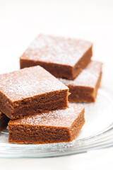 gingerbread  cubes with sugar on the plate