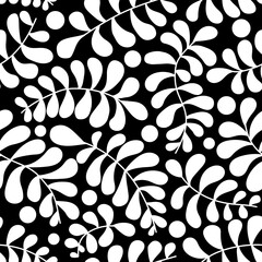 Vector seamless pattern. White abstract drawing with plant elements on a black background. Hand drawn. Use for printing prints on fabrics, wallpapers and more.