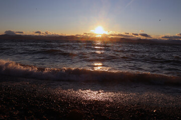 beautiful sunset on the sea, waves.