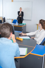 Obraz premium senior confident woman with students