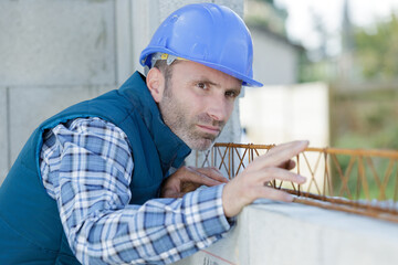 construction worker working on house structure