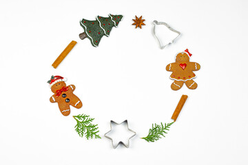 Christmas wreath. Christmas and New Year holidays decorations with fir branches, Christmas tree toys, red berries golden confetti and red stars.