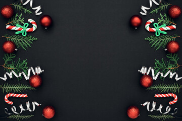 New Year's, festive decor on a black background. Copy space, flat lay, mock up, top view.