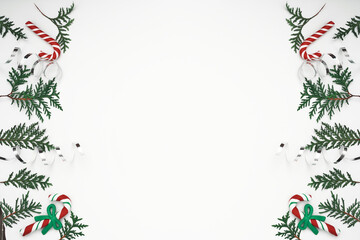 Thuja branches, spruce and New Year's decor. Copy space, flat lay, mock up, top view.