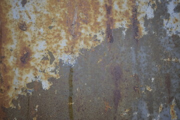 Old rusty metal texture with peeled paint.