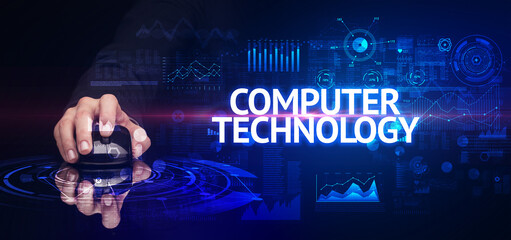 hand holding wireless peripheral with COMPUTER TECHNOLOGY inscription, modern technology concept