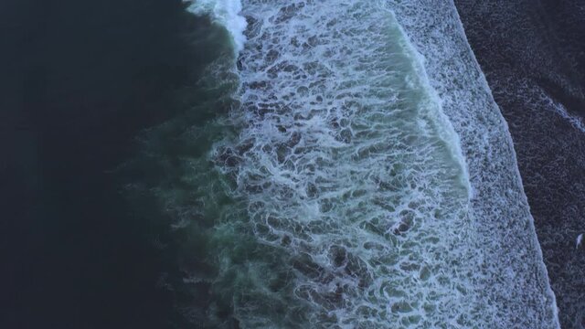 Avachinsky Bay. Waves in the Pacific Ocean. Khalaktyrsky beach with black volcanic sand. Calming natural background.