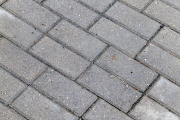 a road made of concrete tiles for pedestrian