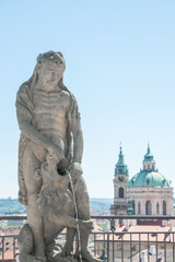 Fototapeta na wymiar Sculpture of a powerful Samson fighting with a lion in Prague, Czech Republic, details, closeup.