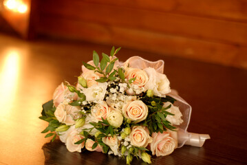 Wedding bouquet left on the wooden floor