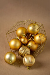 handmade golden Christmas tree toys on kraft paper background