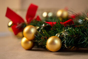handmade golden Christmas tree toys on kraft paper background