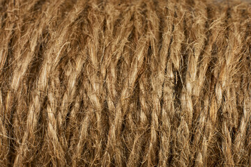 spool of jute thread shot in close-up. strong natural thread