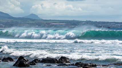 breaking giant wave on the ocean, mauritius