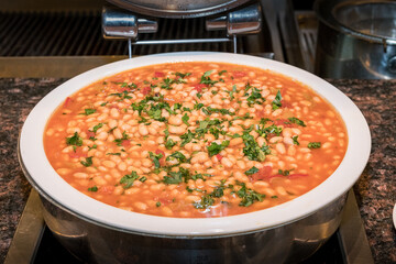 Traditional Turkish food, haricot beans stew on plate.