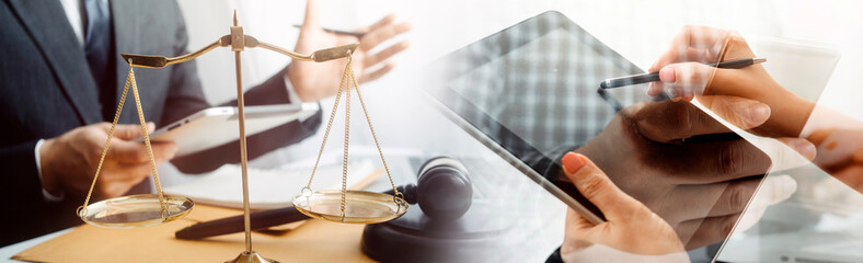 Business and lawyers discussing contract papers with brass scale on desk in office. Law, legal...