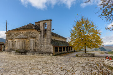 Fototapeta na wymiar old stone church of st tryphon in Vikos village during fall season located in mount Tymfi Zagori, Epirus, Greece, Europe