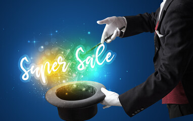 Magician hand conjure with wand and Super Sale inscription, shopping concept