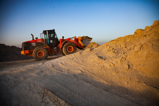 Akbakay, Kazakhstan, April 23 2012: bulldozer Hitachi on gold mine of mining and processing plant. Altynalmas company.