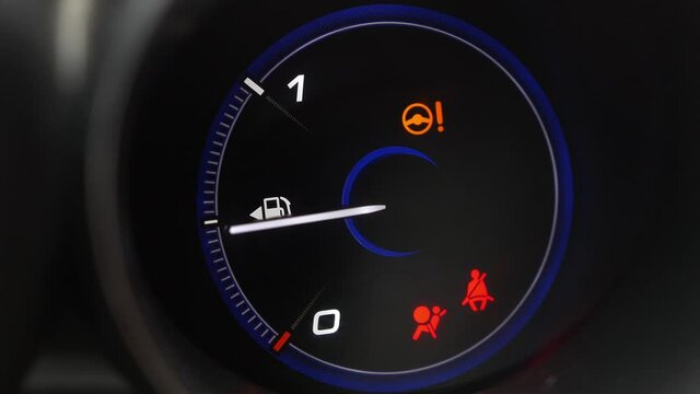 Fuel Gauge and Indicator Lights of Starting and Stopping Car Close Up
