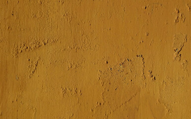 Texture of old metal surface with ochre paint