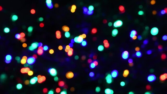 Blurred LED Christmas lights background. Twinkling light sequence