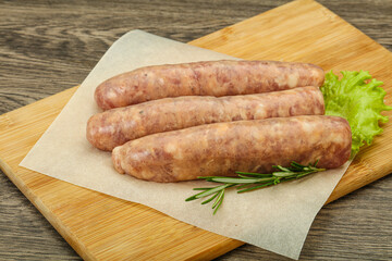 Raw pork meat sausages for grill