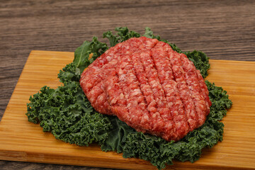Raw beef burger cutlet for cooking