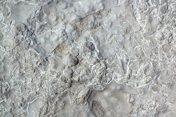 Stone texture covered with calcium deposits. Pamukale texture
