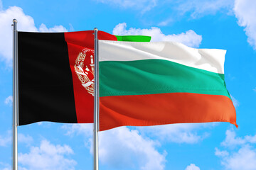 Bulgaria and Afghanistan national flag waving in the wind on a deep blue sky together. High quality fabric. International relations concept.