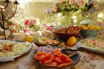 Gourmet seafood table with smoked salmon, crab salad, and prawns