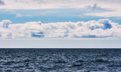 Fototapeta premium the Atlantic Ocean of Sao Miguel against cloudy sky, open water seascape with copy space