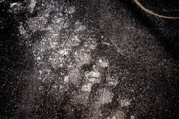Image of Black Asphalt Background Pattern in a Parking Lot with Tire Tracks in a Construction Site for New Pavement
