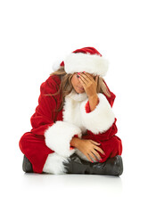 Santa Girl Sits With Hand Covering Face