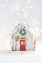 Christmas New Year's gingerbread house. Selective focus, light background
