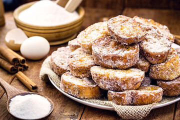 Bread dessert known as gold slice, lamb slice, french toast, Eggy bread, french toast, “Pain Perdu”. Around ingredients, like sugar and egg