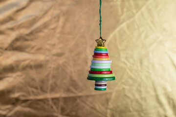 Minimalist holiday season - Christmas tree on a festive background