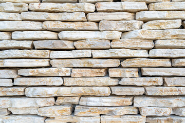 Limestone blocks background. Full frame of natural stone textured background