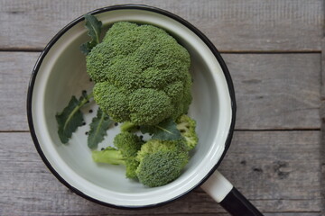 Broccoli on a background of aged wood. selective focus