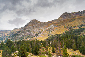 Fototapeta premium Views of the Salvaguardia peak and the Portillon de Benasque on the ascent to Aigualluts in the Posets Maladeta national park in the Benasque Valley