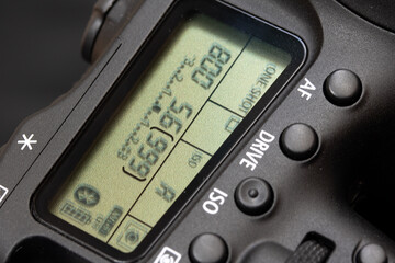 The LCD screen with information on top of the camera. The data display on the digital camera, close...