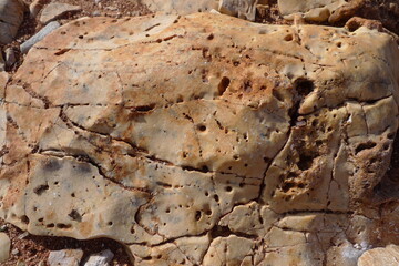 holes in the rock in sardinia, italy