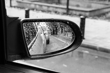 Black and white photography of retro side rear-view mirror