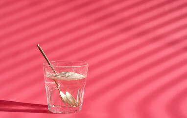 Collagen Protein Powder - Hydrolyzed added to a glass of water for consumption. Additional protein intake. Natural supplement for the beauty and health of skin, bones, joints. Close-up with copy space