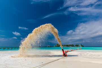 White sandy beach in Maldives with amazing blue lagoon