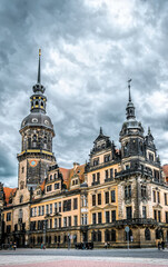 Fototapeta na wymiar Dresden, Saxony / Germany - May 02 2017: Ancient historical quarter of Dresden, Saxony Germany. Palace of the residence of the German kings. Facade of an ancient German castle
