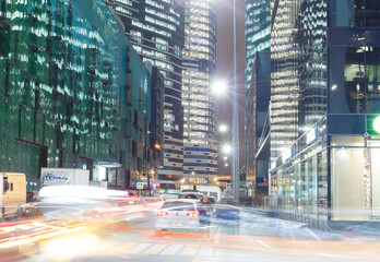 Obraz premium Moscow, Russia, Nov 4, 2020: Office buildings in Moscow International Business Center (Moscow-city). Evening. Street. Long exposure