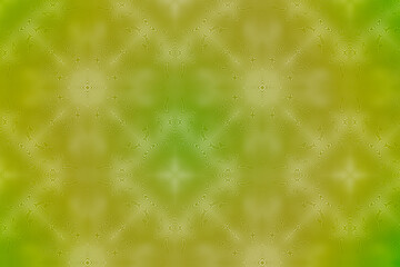 A complex moire pattern, with repeating motifs. Green and yellow color tones.
