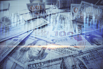 Multi exposure of forex chart drawing over us dollars bill background. Concept of financial success markets.