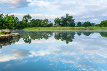 Morning reflections at the lake. (Lake of Espolla, Banyoles, Catalonia, Spain)